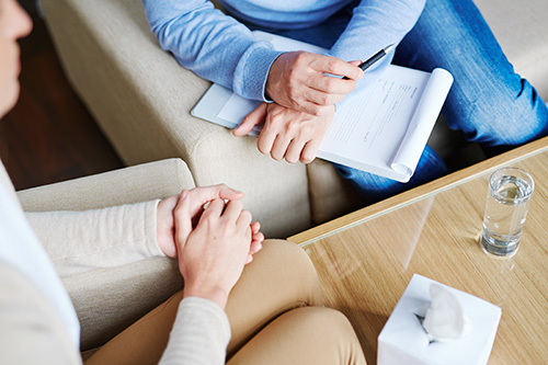 an individual participating in cognitive behavioral therapy