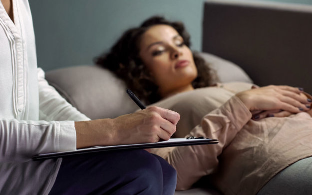 woman in therapy wondering how long does it take to detox from alcohol