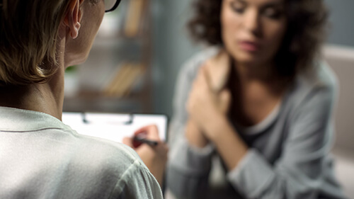 young woman going through trauma-informed care