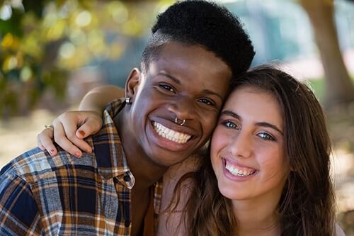 friends smiling after health and wellness education in California