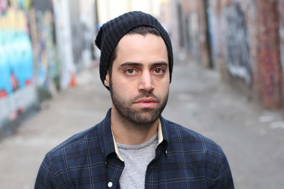 heroin addiction symptoms portrait of a man in an alleyway worried about heroin addiction symptoms