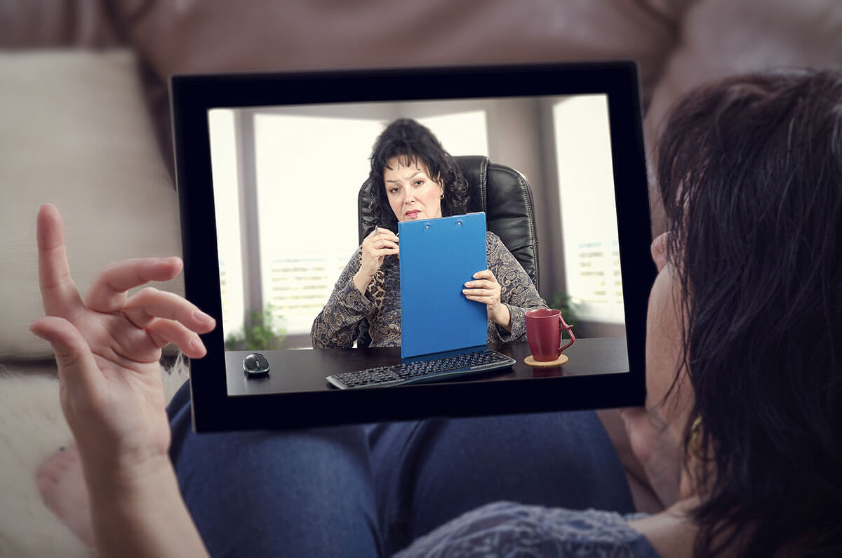 Virtual Intensive Outpatient Program Woman using Telehealth services