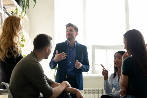 man explaining to group What Are Co-Occurring Disorders
