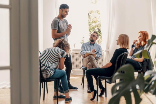 How Drug Rehab Helps Embrace National Substance Abuse Prevention Month group of people at drug rehab embracing National substance abuse prevention month