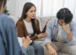 couple in family counseling discussing addiction and relationships