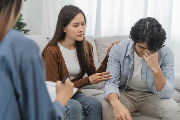 couple in family counseling discussing addiction and relationships