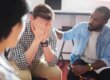 man in long-term alcohol rehab being consoled in a group therapy session