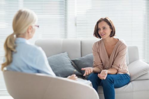 Smiling woman and her counselor as a part of our fentanyl rehab services