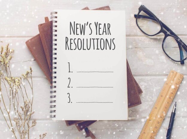 pad of paper with tips on sticking to your new years resolution