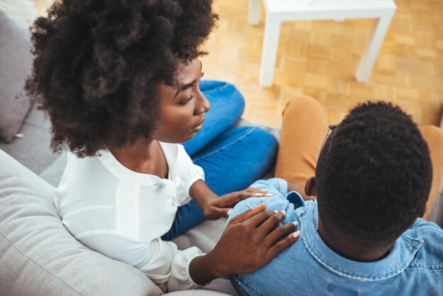 Helping a Loved One With PTSD woman supports her loved one with ptsd