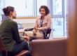 client and therapist talk in a first responder rehab program