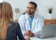 Doctor talking to woman